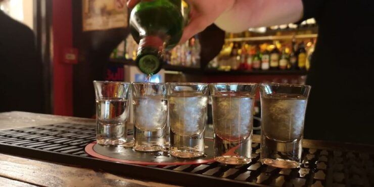 Lisbon: Pub Crawl Walking Tour With Shots and Drinking Games - Tour Overview