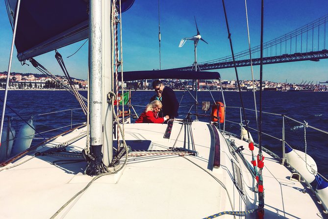Lisbon Sailing Day Cruise With Wine & Snacks - Indulge in Light Snacks and Wine