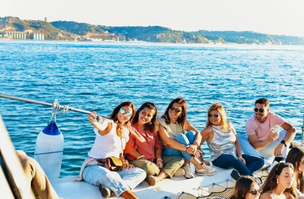 Lisbon: Sunset Catamaran- Music, a Drink & Christmas Lights - Common Questions