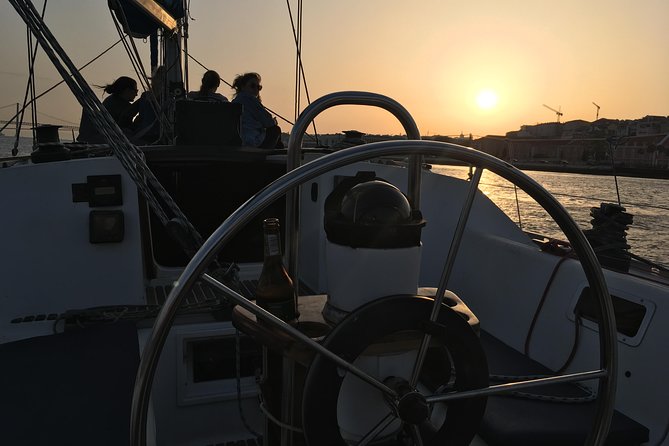 Lisbon Sunset Sensations on a Private Sailing Boat With Wine&Snacks - Limited Group Size