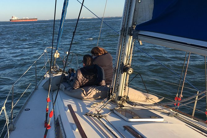 Lisbon Sunset Sensations on a Private Sailing Boat With Wine&Snacks - Unobstructed Views of Lisbon Landmarks