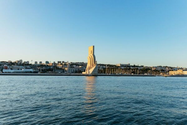 Lisbon: Tagus River Sunset Cruise With Welcome Drink - Enjoy Panoramic Views and Background Music on Board