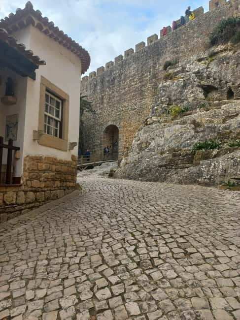 Lisbon: Transfer to Porto with Obidos and Nazare - Authentic Experiences and Local Insights