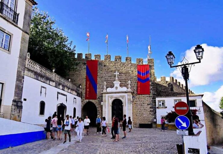 Lisbon: Trip to Porto With Stops in Óbidos-Nazaré-Aveiro - Itinerary and Duration