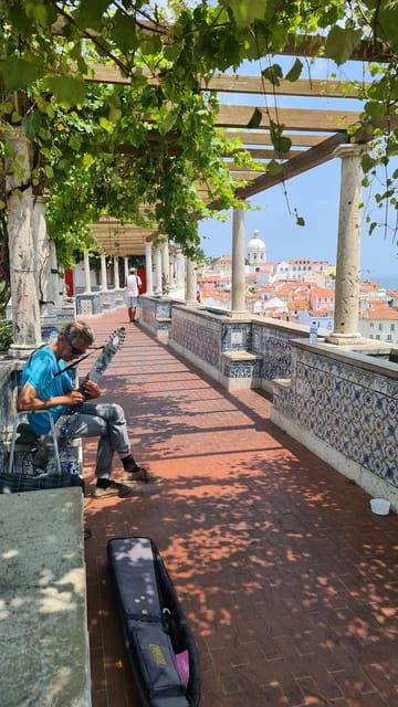 Lisbon: Tuk Tuk 1H30 Tour Old Town Complete with a Old Timer - The Sum Up