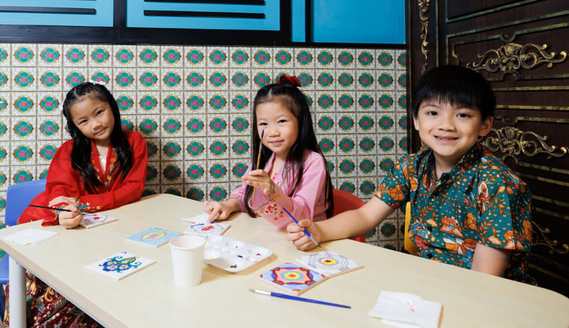 Little Hands, Big Colors: The Intan Peranakan Tile Experience - A small tile with a cultural story