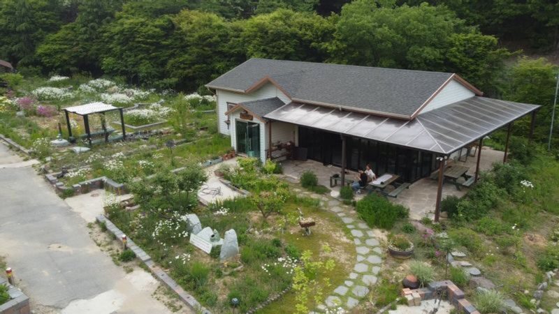 Live Like a Local: Herbal Oil Workshop & Farm Lunch - Making herbal oil by hand