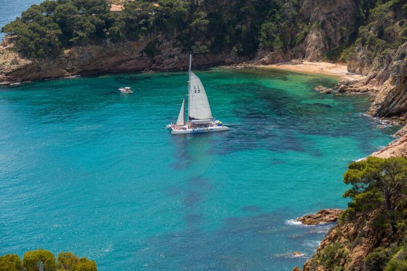 Lloret De Mar: Catamaran Sailing Cruise With BBQ and Drinks - Sailing Route and Onboard Activities