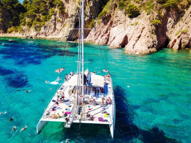 Lloret De Mar: Catamaran Sailing Tour With BBQ and Drinks - Swim and Water Activities