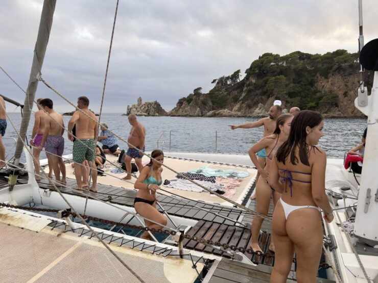 Lloret De Mar: Sunset Catamaran Cruise With DJ and Drinks - Experience Highlights