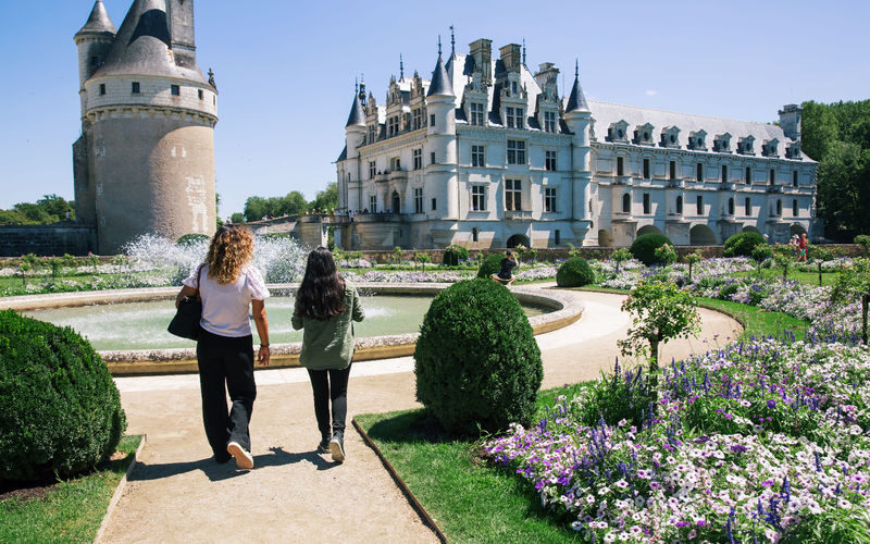 Loire castles private tour in France - Chambord: staircase, scale, and terrace views