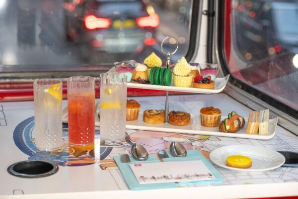 London: Gin and Afternoon Tea Bus Tour With Audio Guide - The Sum Up