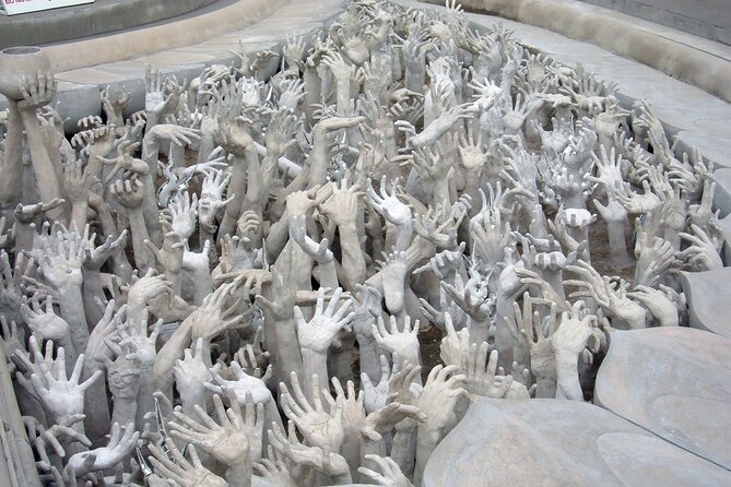 Long Neck Village, White & Blue Temple, Black House Day Tour From Chiang Mai - Common Questions