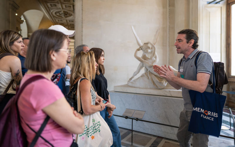 Louvre Museum guided tour with skip-the-line ticket - Following the guide through the museum