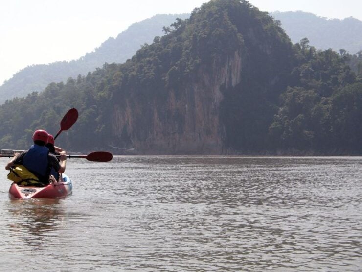 Luang Prabang: Kayak Tour to Pak Ou Caves - Refreshing Dip at Kuang Si Falls