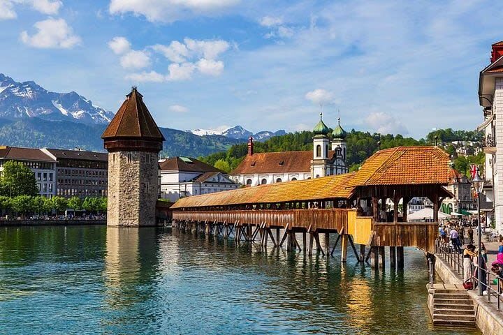 Lucerne City and Lake Cruise Small Group Tour - Jesuit Church and Hofkirche: two different impressions