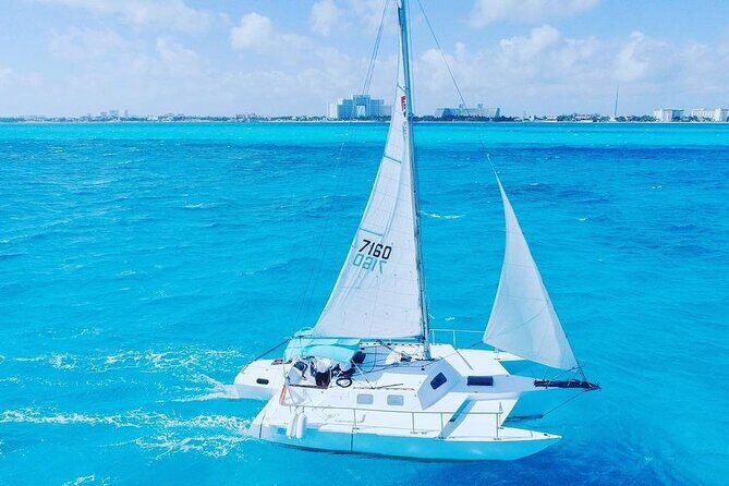 Luxury Catamaran to Isla Mujeres, Snorkeling, Buffet and Ice Bar - Itinerary in Detail