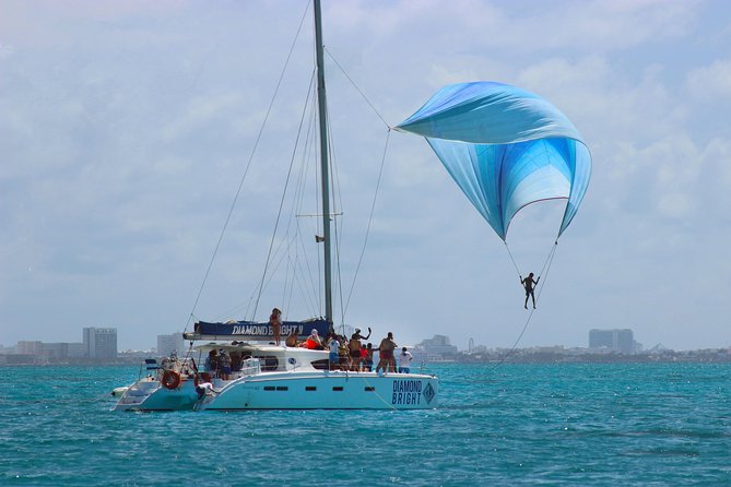 Luxury Catamaran Tour to Isla Mujeres With Transportation From Playa Del Carmen - Pickup and Cancellation Details