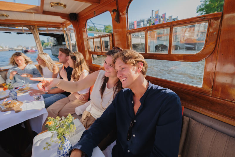 Luxury Saloon Boat Cruise with Optional Cheese & Wine in Amsterdam - Cheese, wine, and the value of the package