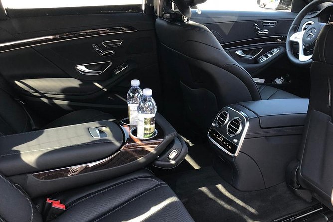 Madrid Airport (MAD) to Madrid - Round-Trip Private Transfer - Booking and Availability