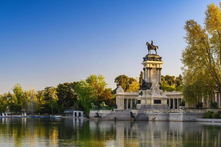 Madrid Bike Tour With Churros Plus Ham & Wine Tasting Option - Tour Features