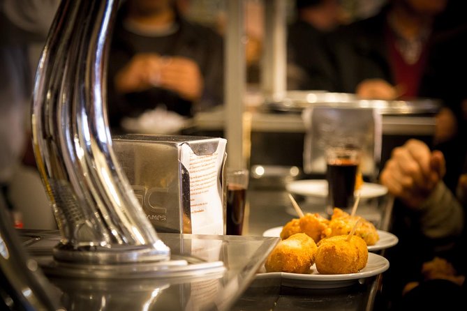 Madrid Historical Walking Tour With Food Tasting and Dinner - Authentic Tapas Bars and Traditional Cuisine