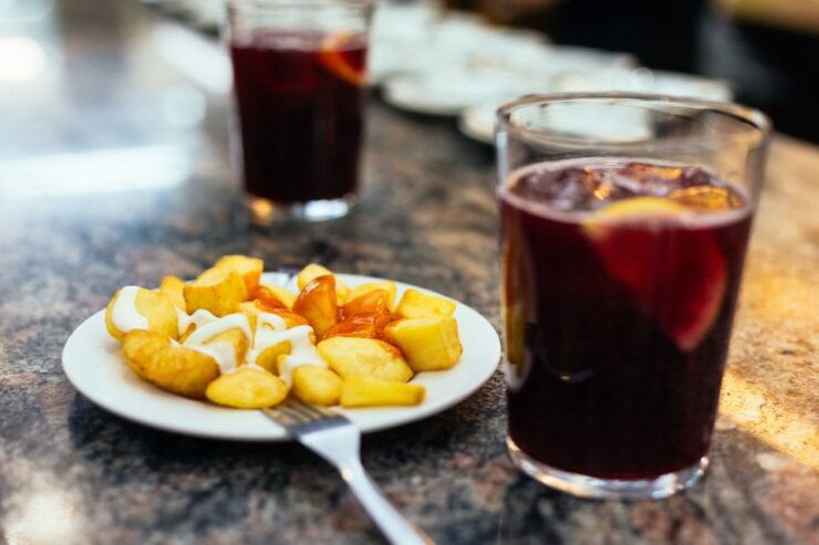 Madrid: Private Food Tour – 10 Tastings With Locals - Patata Bravas and Tortilla Tastings