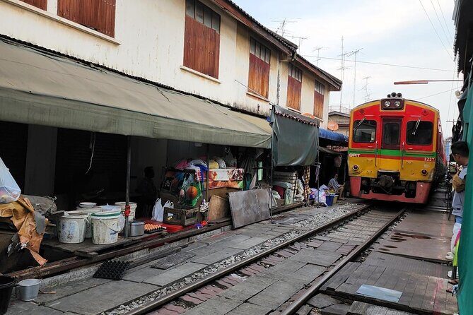 Mae Klong Hoop Rom Market and Floating Market Private Day Tour - The Journey Begins: Comfortable Pickup and First Stop  