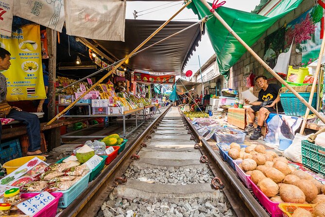 Maeklong Railway & Damnoen Saduak Floating Market Tour – Full Day - Questions and Terms