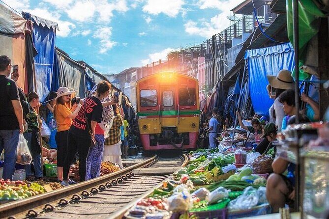 Maeklong Railway Market & Damnoen Saduak Market Paddle Boat Tour - FAQ  