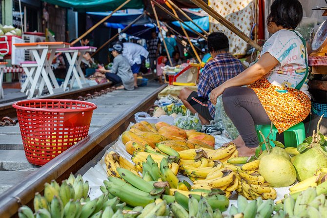 Maeklong Train Market and Damnern Saduak Floating Market Tour With English Guide - Market Experiences