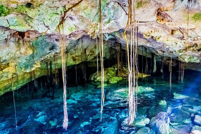 Magical adventure to Tulum, a giant sculpture and cenotes. Lunch included - The Sum Up