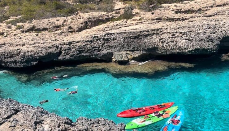 Majorca: Kayak and Paddle Surf Excursion Through Crystal Clear Water Caves - Itinerary and Experience