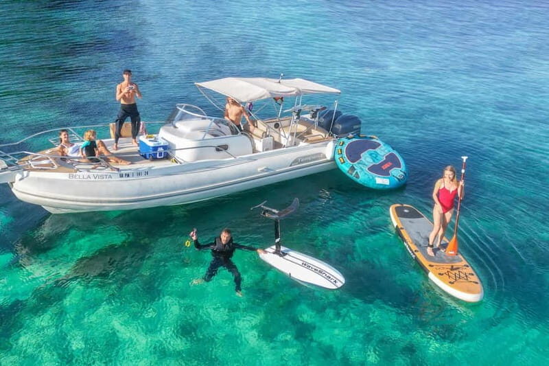 Mallorca: Private Watersports Boat. LUNCH Drinks SUP, Tubing - An Overview of the Experience