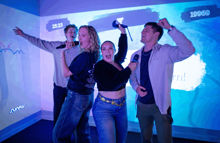Manchester: Trax Social Music Quiz Experience - The Game Structure: A Mix of Brain Teasers and Singing