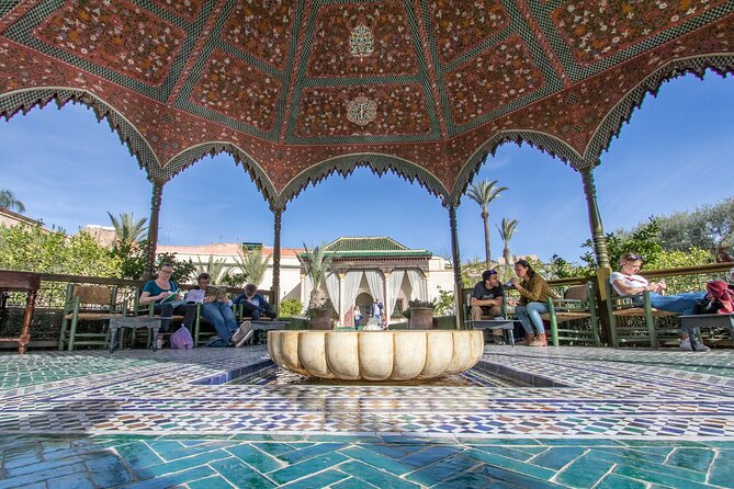 Marrakech: Ben Youssef Madrassa, Secret Garden and Medina Tour - Tour Experience Highlights
