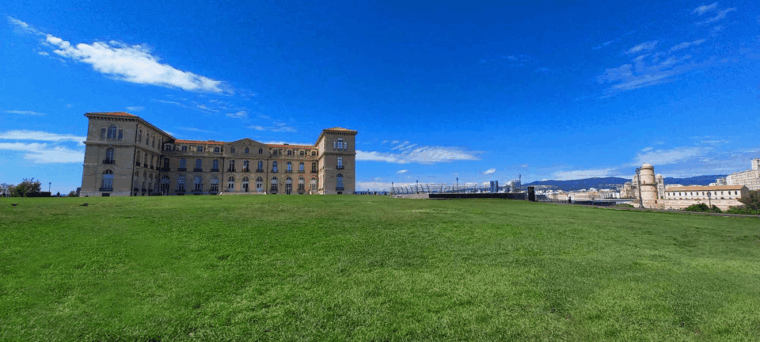 Marseille: Essential Guided Walking Tour of the City - Strolling Down Rue De La République