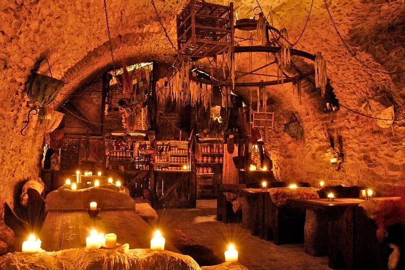 Medieval Dinner with Unlimited Drinks in Prague - Down the stairs into a medieval tavern