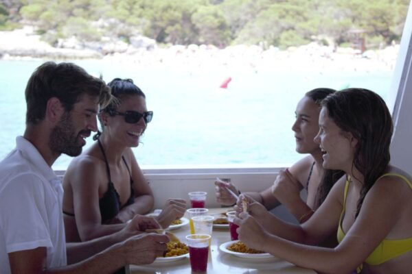 Menorca: Natural Coves and Beaches Boat Trip & Paella Lunch - The Sum Up