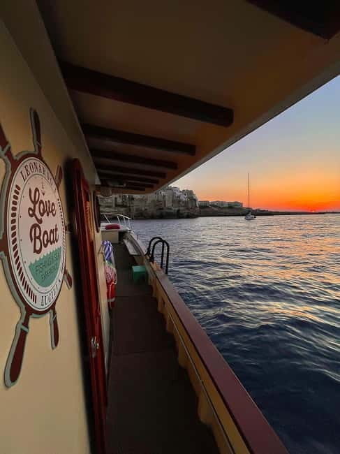 Monopoli-Polignano: sunset boat tour on a traditional wooden boat - An In-Depth Look at the Sunset Boat Tour