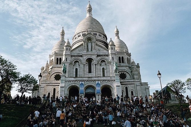 Montmartre District and Sacre Coeur - Exclusive Guided Walking Tour - Price and Booking Details