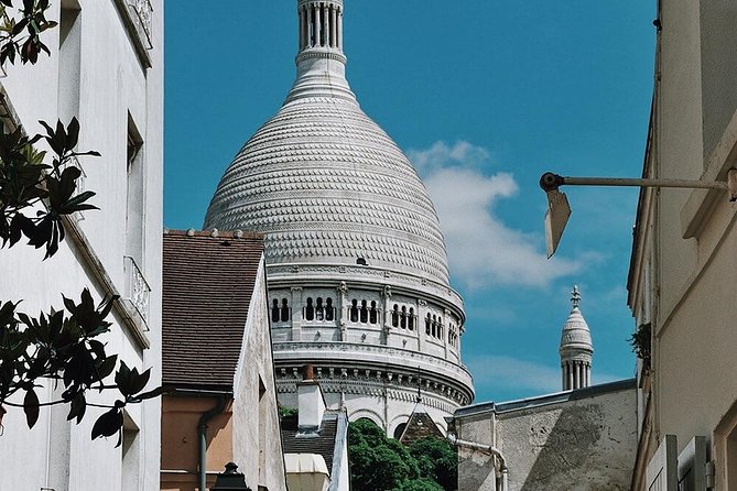 Montmartre District and Sacre Coeur - Exclusive Guided Walking Tour - The Sum Up