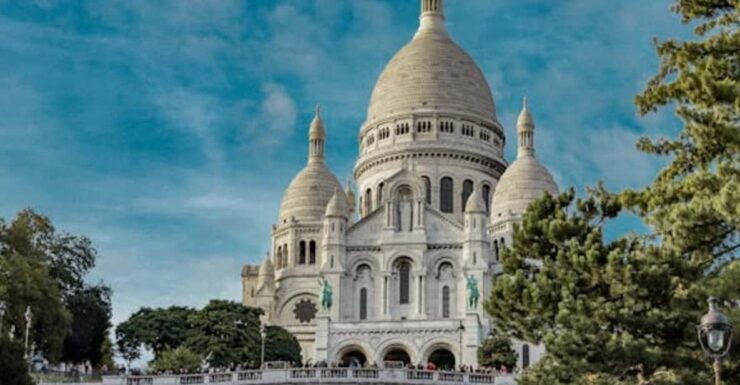 Montmartre Guided Tour With Sacré CœUr Church and City Views - Highlights of Montmartre