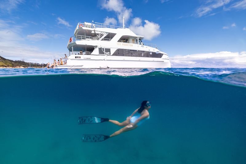 Moreton Island & Tangalooma Wrecks Snorkel Cruise - Crossing Moreton Bay in a large catamaran