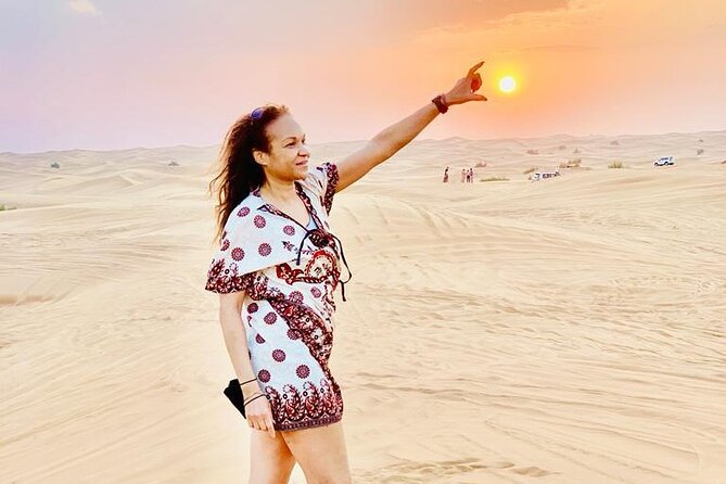 Morning Camel Trekking Over the Red Sand Dunes - Overview of the Camel Trekking Experience