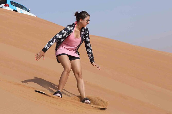 Morning Dubai Desert Safari With Dune Bashing & Sandboarding & Camel Riding - Experience the Thrilling Dune Bashing at Sunrise