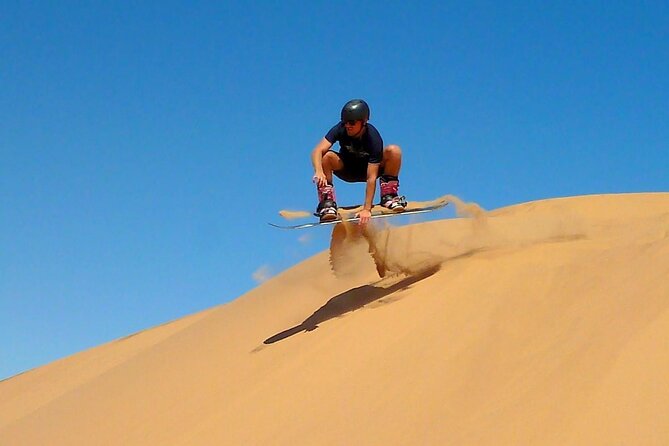 Morning Red Dune Desert Safari in Dubai With Camel Ride and Sand Boarding - Dates and Arabic Coffee at Our Beautiful Camp