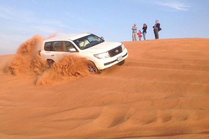 Morning Red Dunes Desert by Quad Bike, Dune Bashing, Camel Ride & Sandboarding - Overview of Morning Red Dunes Desert Experience