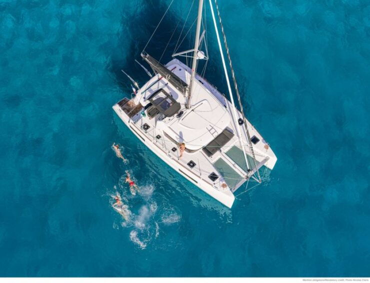 Mykonos: Private Catamaran Cruise W/ Food, Drinks & Transfer - Experience