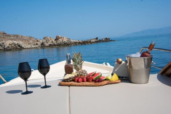 Mykonos: Private Cruise by Wooden Boat With Snorkeling - The Sum Up